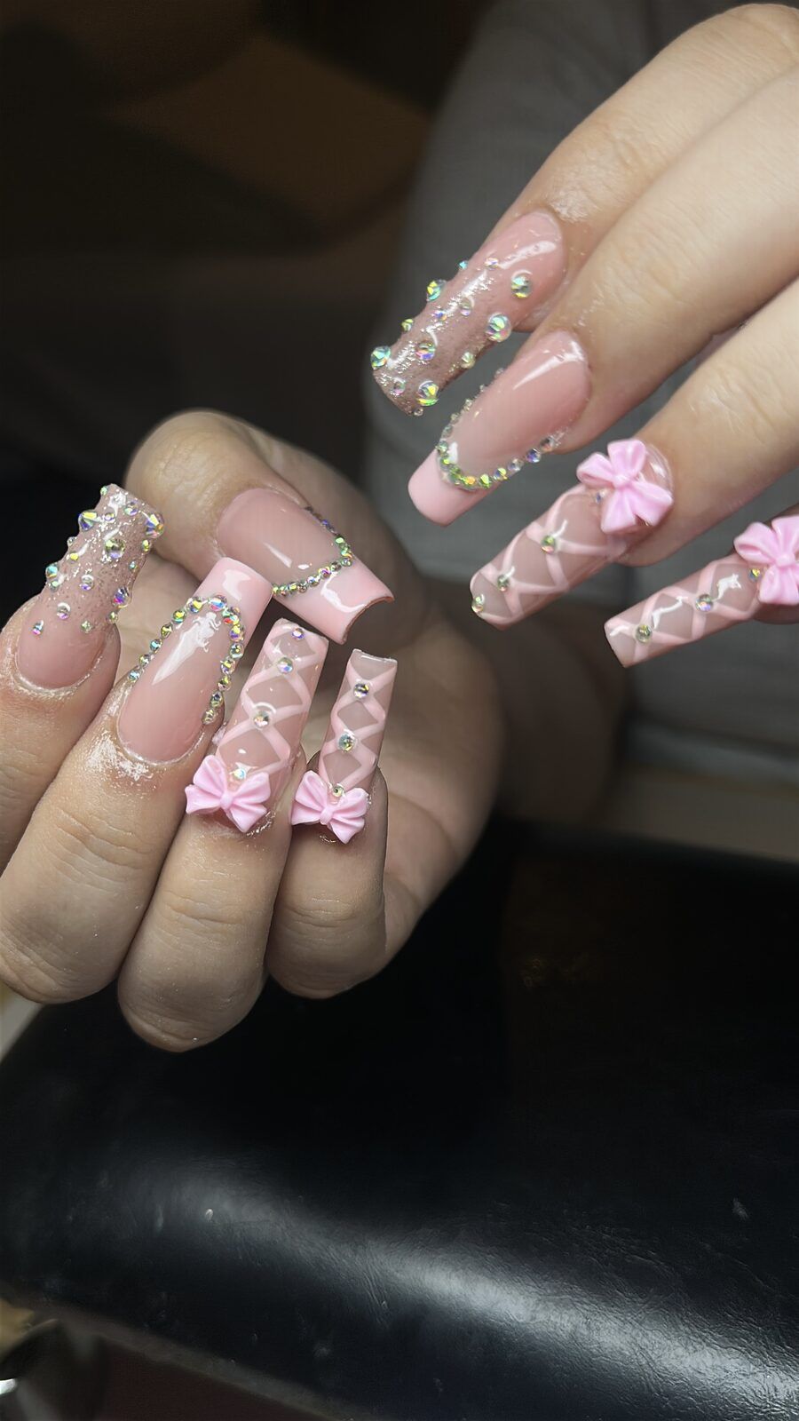Long Gel X extensions pink with crystals and 3D bows - Wolf SGX Montreal